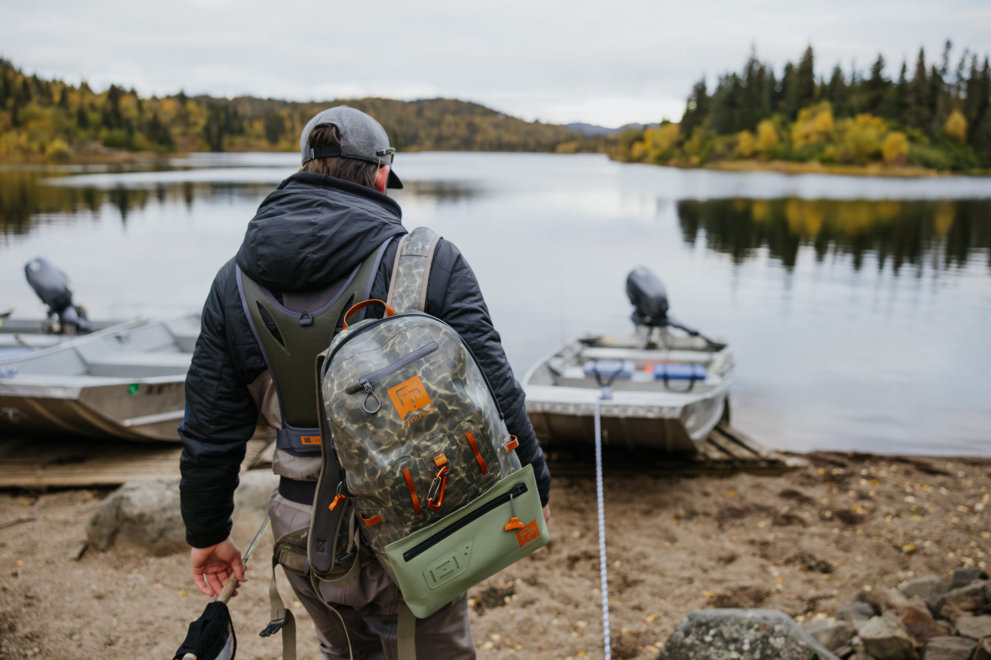backpack walking towards boat