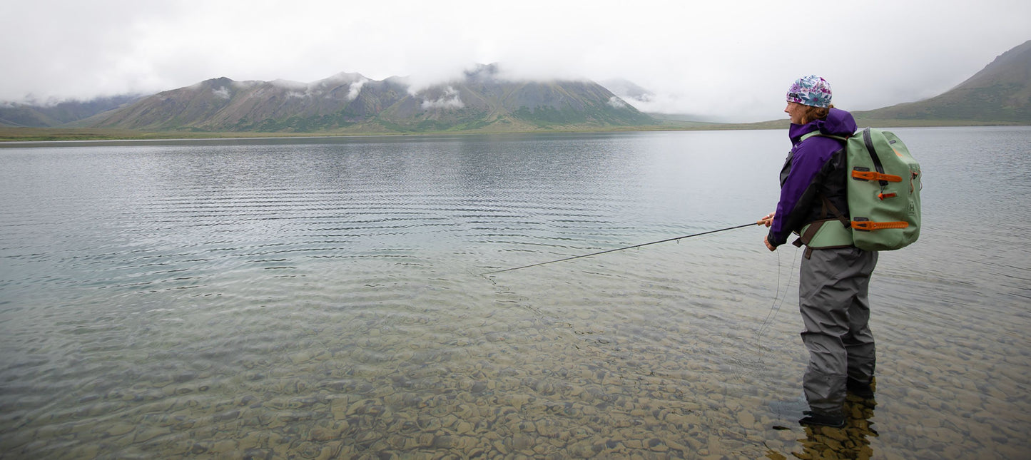 fishing with backpack in alaska